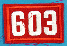 603 Unit Number White on Red