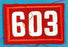 603 Unit Number White on Red