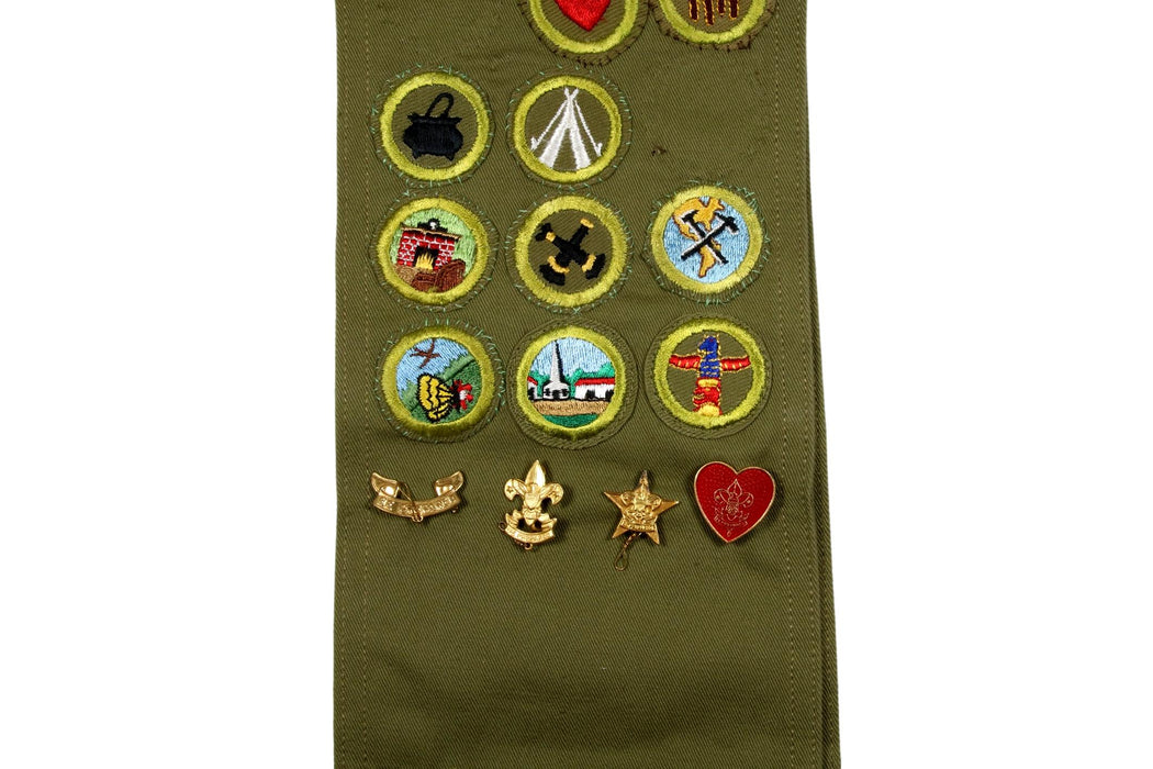 Merit Badge Sash 1950s with 14 Khaki Crimped Merit Badges and 5 Rank Pins on 1950s Sash