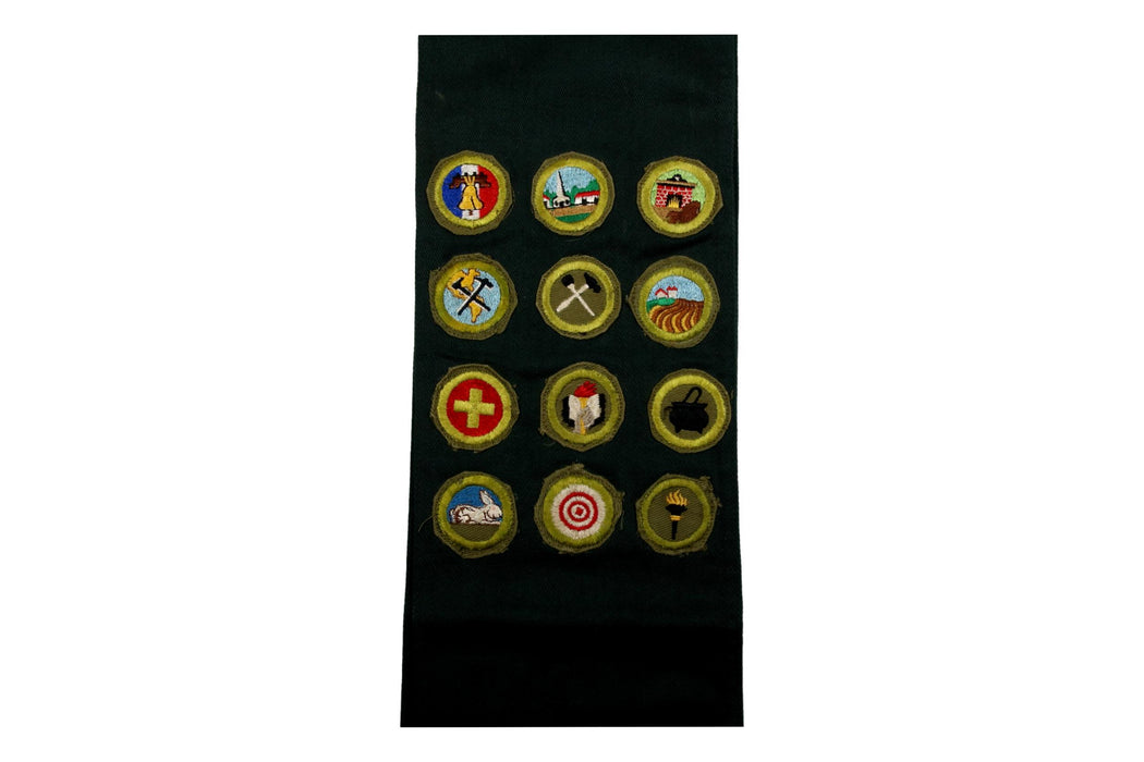 Merit Badge Sash 1950s with 12 Kahki Crimped Merit Badges on Explorer Green