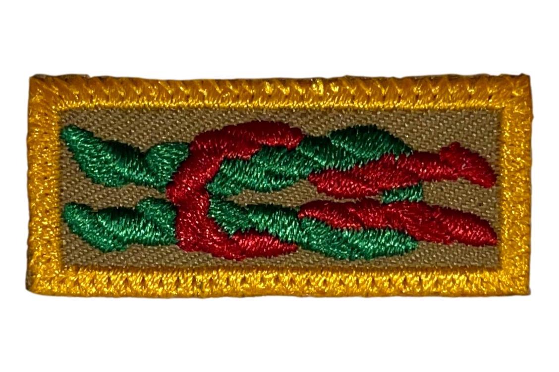 Arrow of Light Knot on Tan